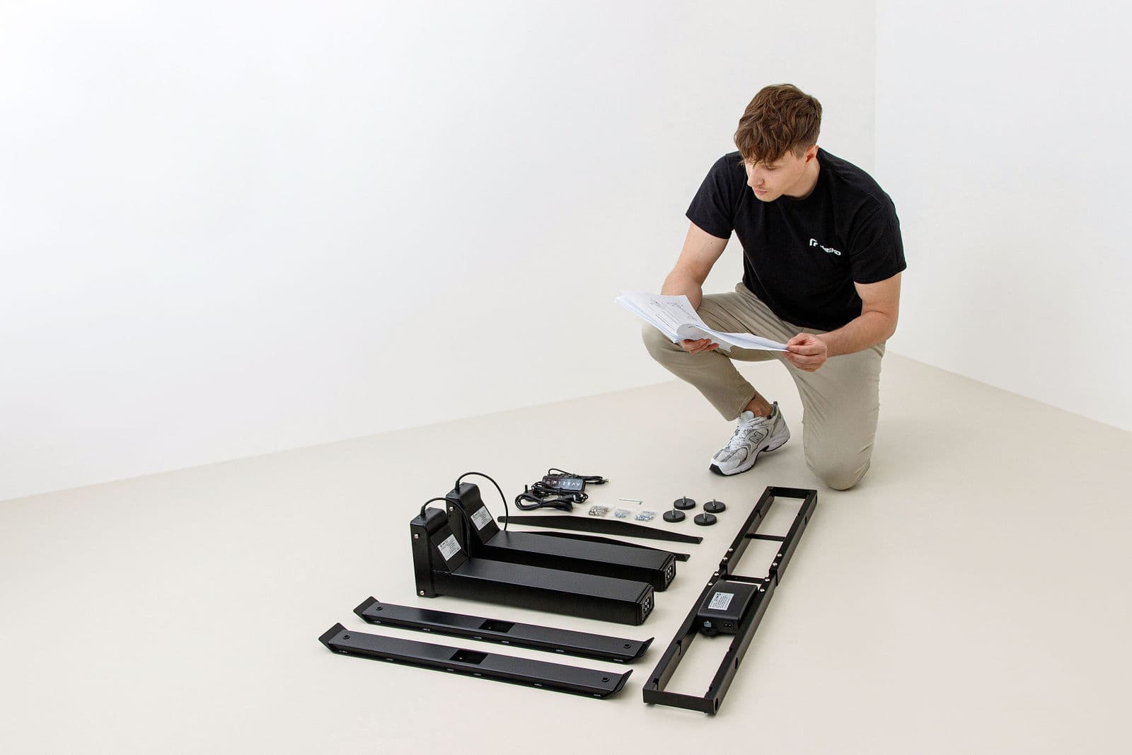 Assembly manual and fixings laid out before the build
